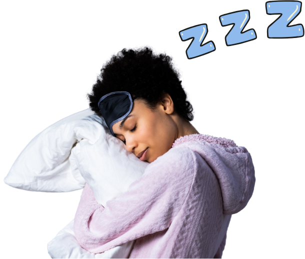 black woman with sleep mask hugging a pillow and sleep zzz