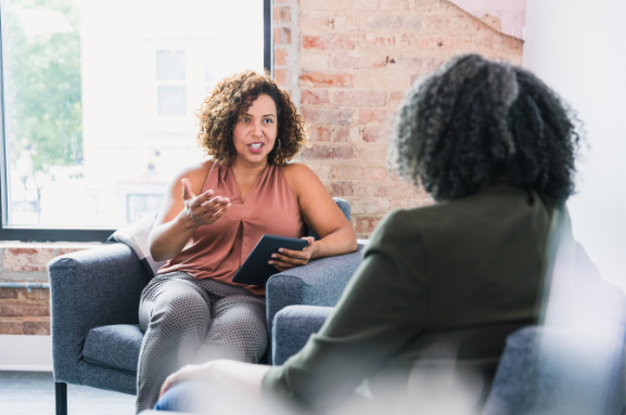 woman talking to a therapist